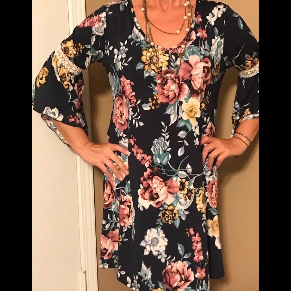 Floral dress with sweet eyelet detail